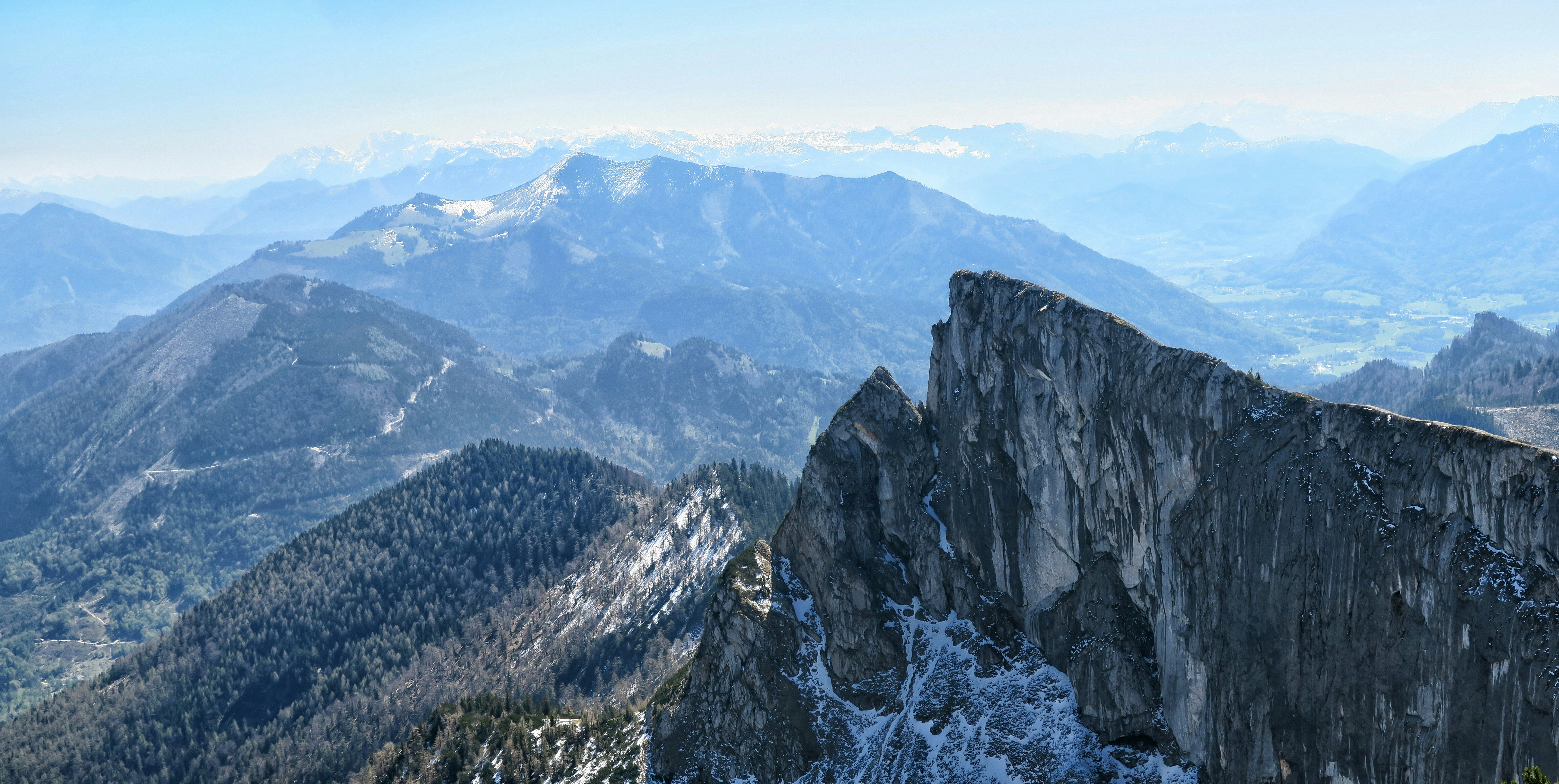 gray rocky mountain under blue sky during daytime